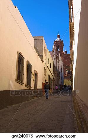 Man walking in an alley, Callejon De Veyna, Zacatecas City, Zacatecas State, Mexico View Large Photo Image Stock Photography - Man walking in an alley, Callejon De Veyna, Zacatecas City, Zacatecas State, Mexico. Fotosearch