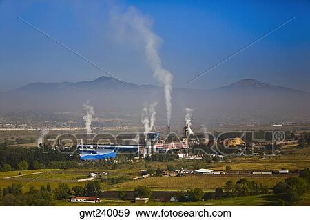 Smoke emitting from smoke stacks, Morelia, Michoacan State, Mexico View Large Photo Image Stock Photo - Smoke emitting from smoke stacks, Morelia, Michoacan State, Mexico. Fotosearch