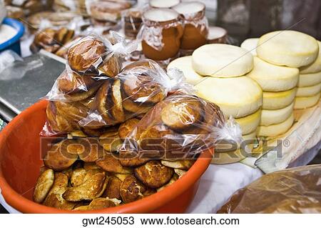 Breads and stacks of cheese at a market stall, Zacatecas State, Mexico View Large Photo Image Stock Image - Breads and stacks of cheese at a market stall, Zacatecas State, Mexico. Fotosearch