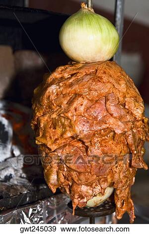 Stock Photo - Grilled meat with vegetables on a skewer, Cuetzalan, Puebla State, Mexico. Fotosearch