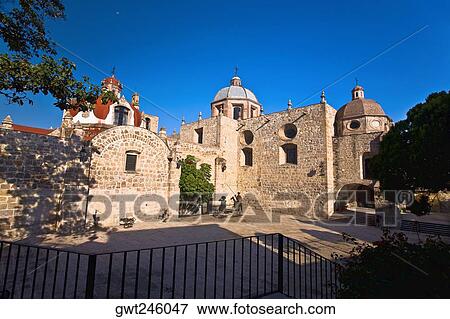 Stock Photo - Trees in front of a church, Iglesia Del Carmen, Morelia, Michoacan State, Mexico. Fotosearch
