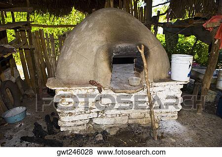 Wooden stick in front of a stove View Large Photo Image Stock Photo - Wooden stick in front of a stove. Fotosearch