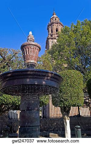 Fountain in front of a cathedral, Morelia Cathedral, Morelia, Michoacan State, Mexico View Large Photo Image Stock Photo - Fountain in front of a cathedral, Morelia Cathedral, Morelia, Michoacan State, Mexico. Fotosearch