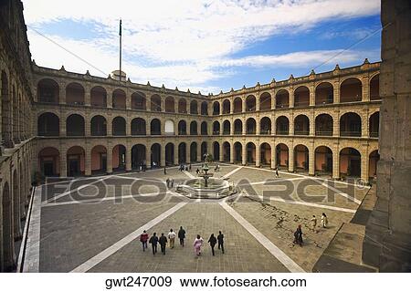 High angle view of tourists in the courtyard of a palace, National Palace, Zocalo, Mexico City, Mexico View Large Photo Image Stock Photo - High angle view of tourists in the courtyard of a palace, National Palace, Zocalo, Mexico City, Mexico. Fotosearch