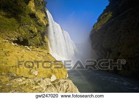 Low angle view of a waterfall, Tamul Waterfall, Aquismon, San Luis Potosi, Mexico View Large Photo Image Stock Image - Low angle view of a waterfall, Tamul Waterfall, Aquismon, San Luis Potosi, Mexico. Fotosearch