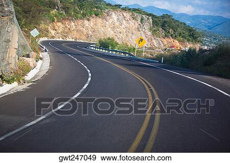 Road passing through mountains, San Luis Potosi, Mexico View Large Photo Image Stock Photo - Road passing through mountains, San Luis Potosi, Mexico. Fotosearch