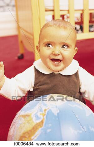 Picture - baby, inside, indoors, people, game, play, playing. Fotosearch