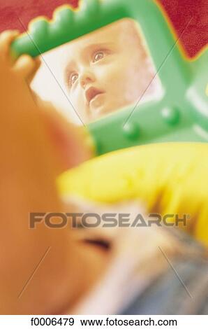 Stock Photo - baby, inside, indoors, people, game, play, playing. Fotosearch