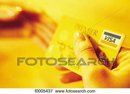 bank card, consumption, finance, economics, financial, payment, hand View Large Photo Image Stock Photo - bank card, consumption, finance, economics, financial, payment, hand. Fotosearch