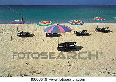 Stock Photograph - beach, beaches, sea, sand, vacation, holidays, parasol. Fotosearch