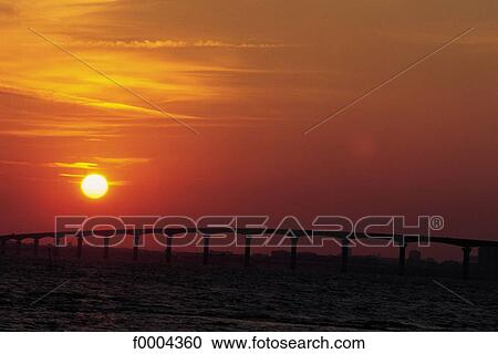 bridge, sunset, setting sun, sky, sun, Charente Maritime, Europe View Large Photo Image Stock Image - bridge, sunset, setting sun, sky, sun, Charente Maritime, Europe. Fotosearch