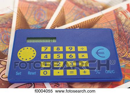 calculator, calculating machine, bill, banknote, euro, bank, currency View Large Photo Image Stock Photography - calculator, calculating machine, bill, banknote, euro, bank, currency. Fotosearch