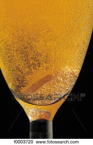 Stock Image - Champagne, glass of Champagne, bubble, alcohol, celebration, drink. Fotosearch