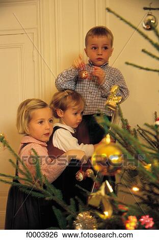 child, children, Christmas, Xmas, girl, boy, Christmas decoration View Large Photo Image Stock Photograph - child, children, Christmas, Xmas, girl, boy, Christmas decoration. Fotosearch