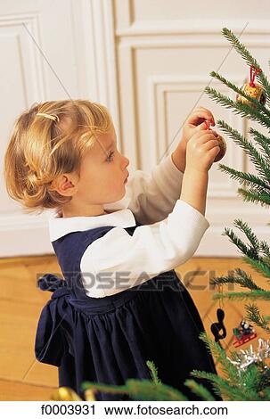 child, children, girl, Christmas, Xmas, celebration, aware View Large Photo Image Stock Image - child, children, girl, Christmas, Xmas, celebration, aware. Fotosearch