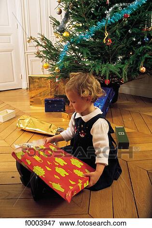 Christmas tree, Christmas decoration, Christmas, Xmas, celebration, tradition, people View Large Photo Image Stock Photo - Christmas tree, Christmas decoration, Christmas, Xmas, celebration, tradition, people. Fotosearch