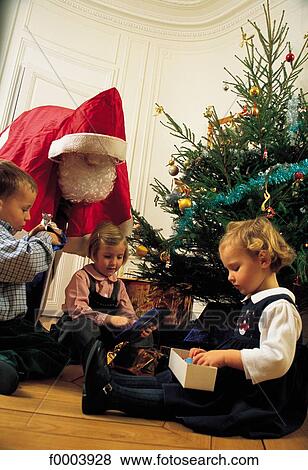 Christmas, Xmas, celebration, child, children, girl, boy View Large Photo Image Stock Photo - Christmas, Xmas, celebration, child, children, girl, boy. Fotosearch