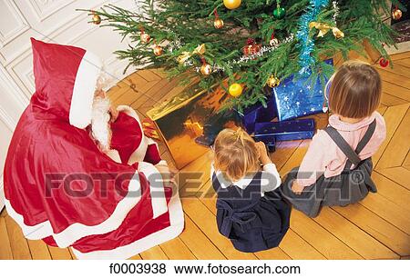 Christmas, Xmas, celebration, tradition, child, children, people View Large Photo Image Stock Photo - Christmas, Xmas, celebration, tradition, child, children, people. Fotosearch