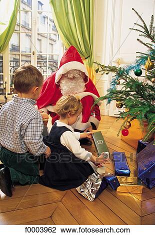 Christmas, Xmas, Santa Claus, child, children, girl, boy View Large Photo Image Stock Image - Christmas, Xmas, Santa Claus, child, children, girl, boy. Fotosearch