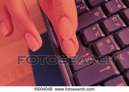 Stock Photo - computer, keyboard, computing, finger, computer imput, business, technology. Fotosearch