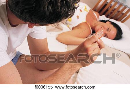 Stock Photography - couple, inside, indoors, people, men. Fotosearch