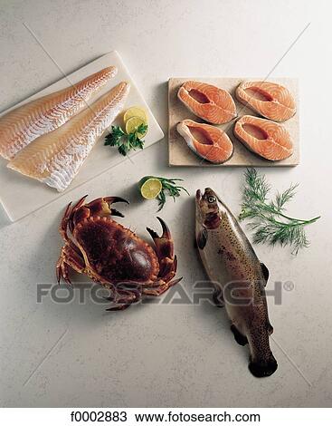 Stock Image - crab, aliment, trout, fish, seafood, shellfish, aliment. Fotosearch
