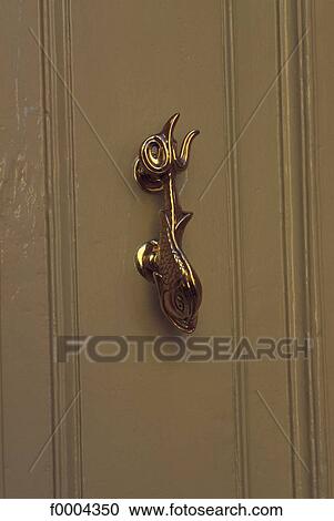 door handle, object, objects, metal, door knocker, fish, animal in art View Large Photo Image Stock Image - door handle, object, objects, metal, door knocker, fish, animal in art. Fotosearch