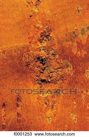 Stock Image - erosion, rust, metal, rusty metal, orange, exterior. Fotosearch