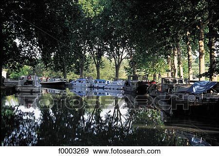 Europe, France, French, French leisure boat, canal, Canal du Midi, Capestang View Large Photo Image Stock Photo - Europe, France, French, French leisure boat, canal, Canal du Midi, Capestang. Fotosearch
