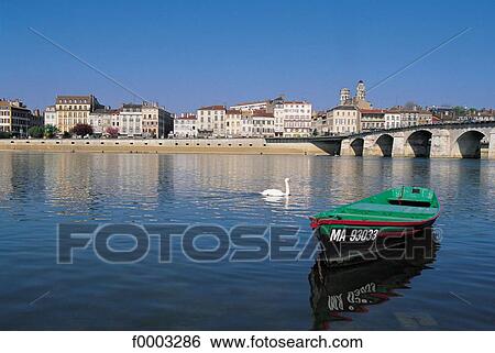 Stock Photograph - Europe, France, French, French river, bridge, town, city. Fotosearch