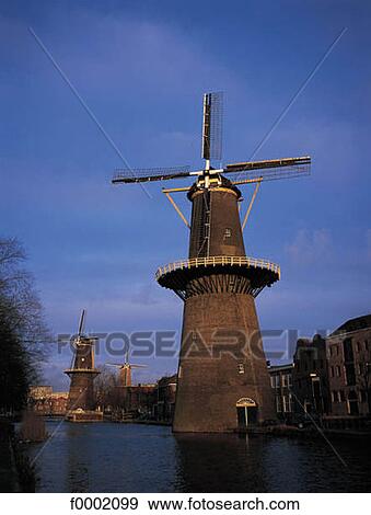 Stock Photo - Europe, windmill, canal, Holland, Netherlands, Rotterdam. Fotosearch