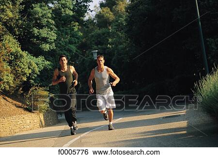 Stock Photograph - exterior, open air, men, dynamism, dynamics. Fotosearch