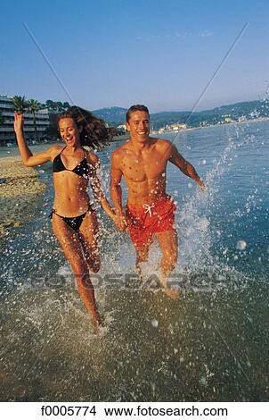 Picture - exterior, open air, men, sea, swimming costume. Fotosearch