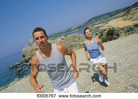 Stock Photo - exterior, open air, men, woman, women. Fotosearch