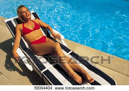 exterior, open air, woman, women, swimming pool, tanning View Large Photo Image Picture - exterior, open air, woman, women, swimming pool, tanning. Fotosearch