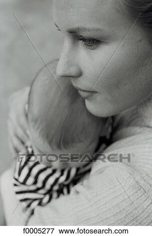 Stock Photo - family, woman, women, people, baby, tenderness, affection. Fotosearch