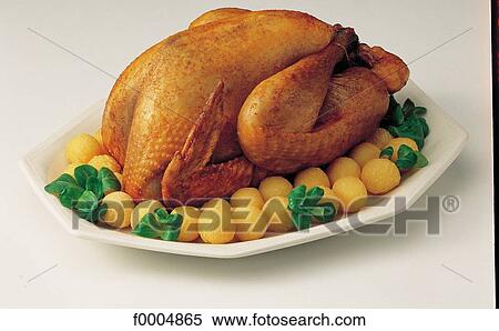 Stock Photography - gastronomy, food, cooked dish, fowl, chicken, roast chicken, vegetable. Fotosearch