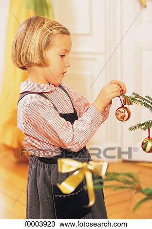 girl, people, Christmas, Xmas, Christmas decoration, child, children View Large Photo Image Stock Image - girl, people, Christmas, Xmas, Christmas decoration, child, children. Fotosearch