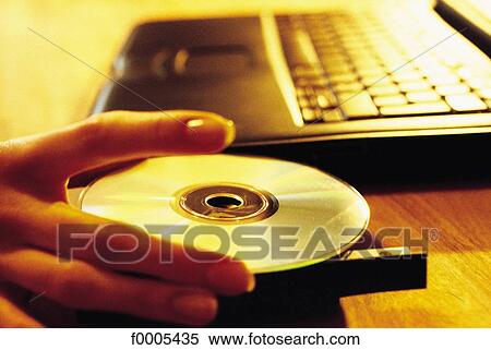 hand, hands, computer, technology, compact disc, computing View Large Photo Image Stock Photography - hand, hands, computer, technology, compact disc, computing. Fotosearch