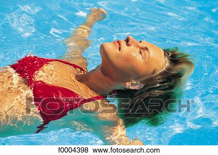 heat, people, woman, women, swimming costume, swimming pool View Large Photo Image Stock Photo - heat, people, woman, women, swimming costume, swimming pool. Fotosearch
