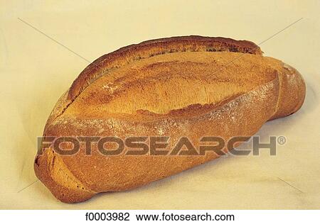 Stock Image - indoors, bread, inside, farmhouse bread, cereal bread, aliment. Fotosearch