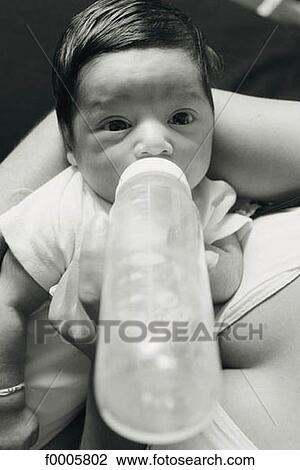 inside, indoors, baby, bottle, meal, eat, eating View Large Photo Image Stock Image - inside, indoors, baby, bottle, meal, eat, eating. Fotosearch