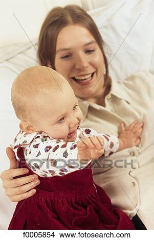 inside, indoors, baby, mother, mummy, mum, tenderness View Large Photo Image Picture - inside, indoors, baby, mother, mummy, mum, tenderness. Fotosearch