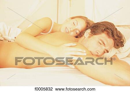 Stock Image - inside, indoors, men, couple, woman. Fotosearch