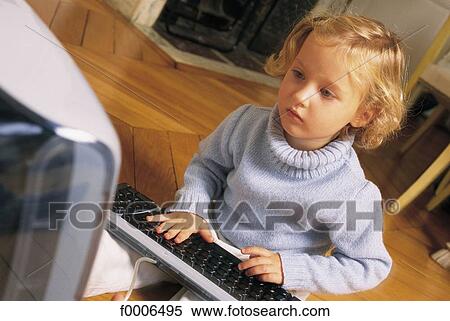 inside, indoors, people, computer, computer keyboard, computing, girl View Large Photo Image Stock Photography - inside, indoors, people, computer, computer keyboard, computing, girl. Fotosearch