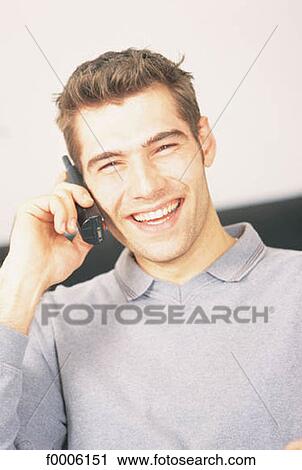 Stock Image - inside, indoors, people, men, dark hair. Fotosearch