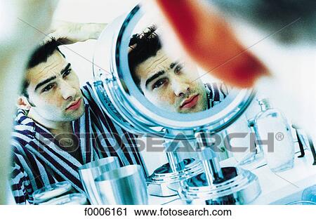 Stock Image - inside, indoors, people, men, dark hair. Fotosearch