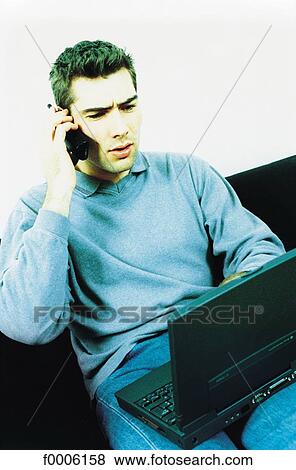 Stock Photo - inside, indoors, people, men, dark hair. Fotosearch
