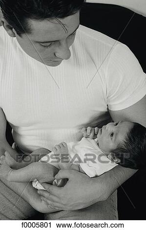 inside, indoors, teenage boy, baby, tenderness, affection, tender View Large Photo Image Stock Image - inside, indoors, teenage boy, baby, tenderness, affection, tender. Fotosearch