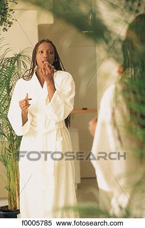 Stock Photography - inside, indoors, woman, women, black, black woman. Fotosearch